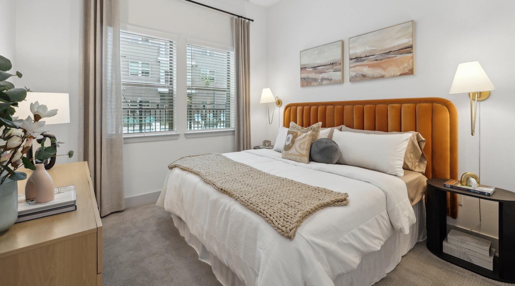 a bedroom with a bed and a dresser