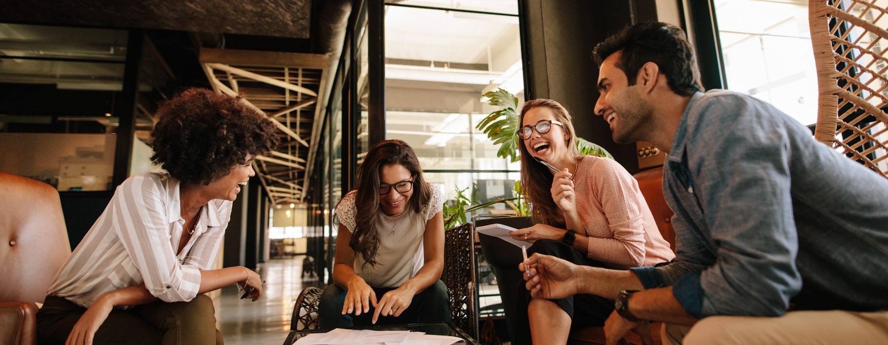 people sitting at a table laughing